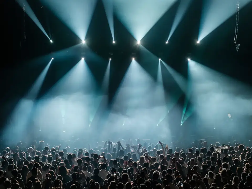 Live event under dramatic stage lighting
